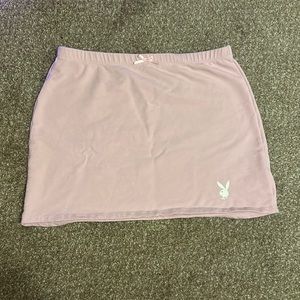 Light pink playboy mini skirt